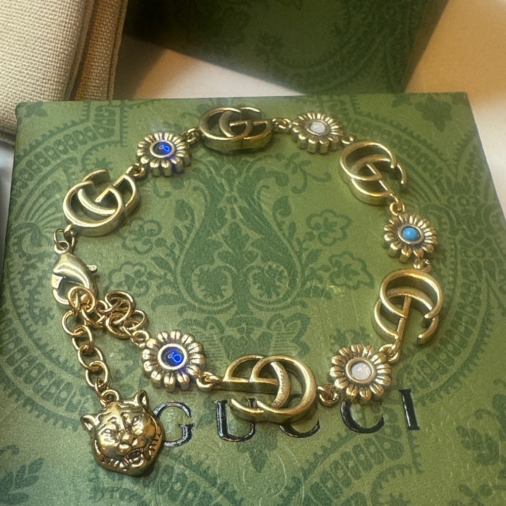 Gucci Gold Bracelet with Blue Accents